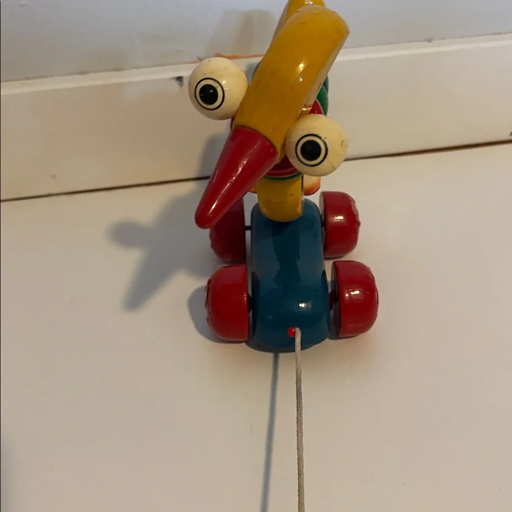 Vintage Kouvalias exotic bird Pull Toy 1990s